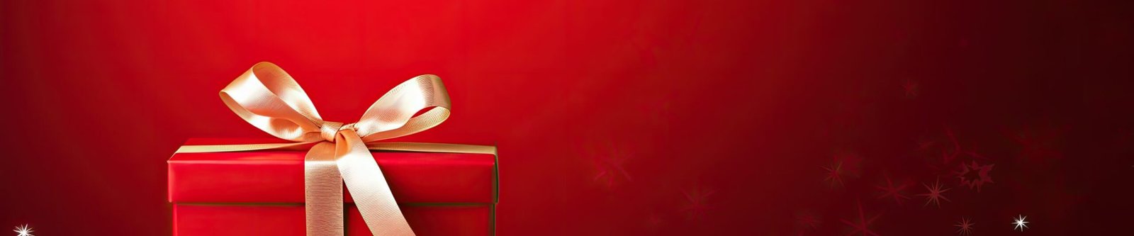 red gift box with gold ribbon on red background. Copy space
